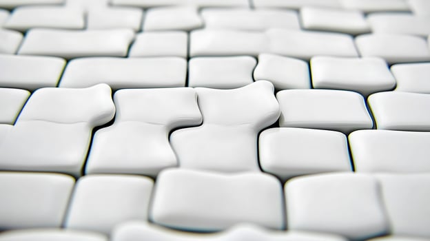 Close-up view of textured white tiles arranged in a seamless pattern on a surface photo