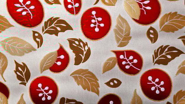 Colorful fabric pattern featuring red leaves and gold accents against a white background photo