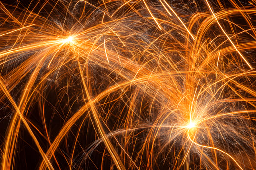 Abstract Fiery Sparkler Trails Light Painting Photography Nighttime Festive Background photo