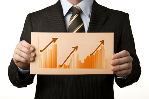 Businessman Holding Chart Showing Upward Trending Growth Graphs Financial Success Investment photo