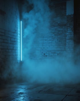 A neon light is shining in a dark room photo