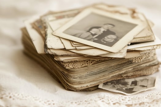 Old photographs on a bed photo