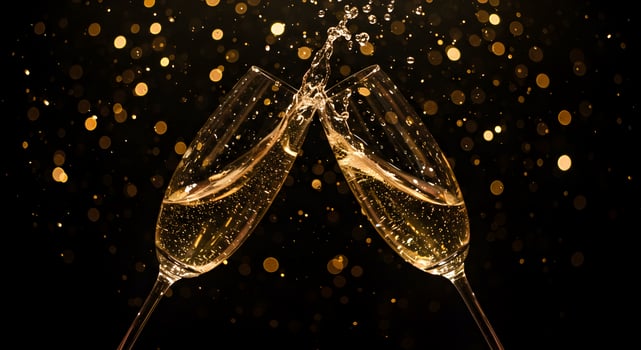 Elegant champagne toast celebration with golden bokeh background sparkles photo