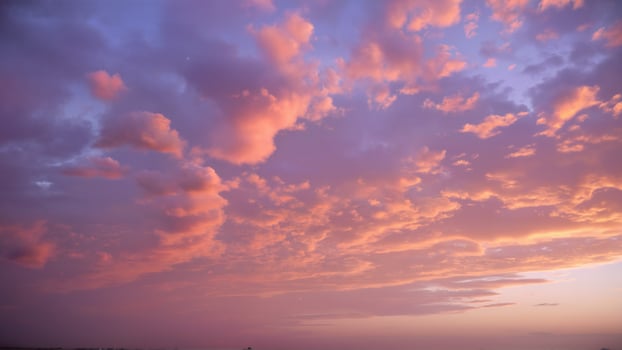 Stunning Sunset Sky with Colorful Clouds during Dusk photo