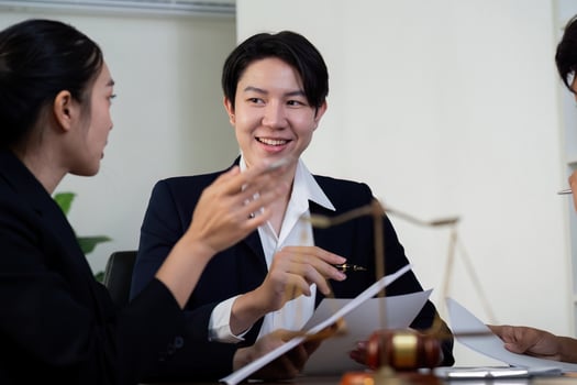 Collaboration and Legal Solutions. A team of attorneys discussing case strategies. photo