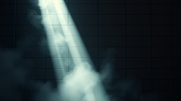 Mysterious spotlight shining through a smoky atmosphere and dark tiles wall. photo