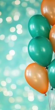 Colorful balloons with teal and orange on a bokeh background photo