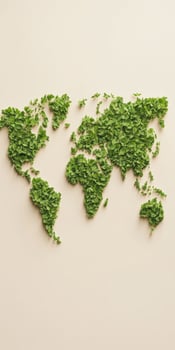 Green world map created with leaves on a light background symbolizing environmental awareness photo