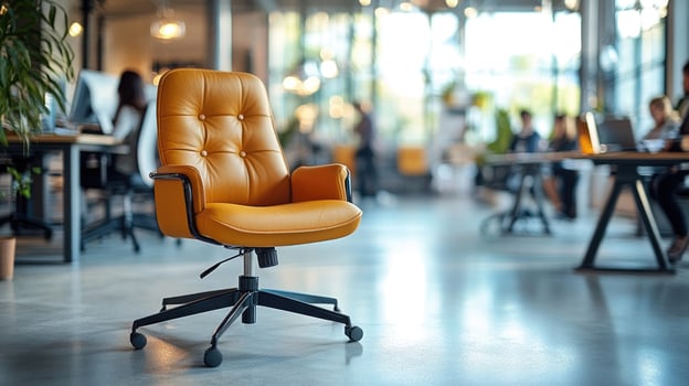 Comfortable yellow office chair standing in modern coworking space photo
