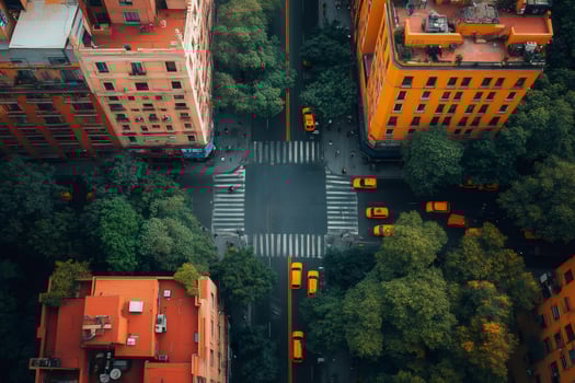 Yellow cabs passing through crossroad in new york city during the day photo