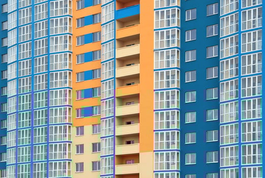 Modern multistorey building painted in bright colors photo