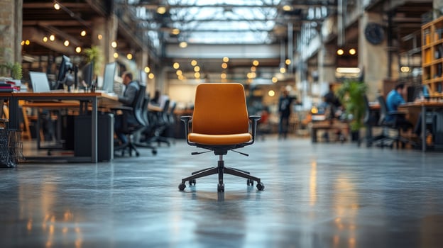 Empty ergonomic office chair standing in a modern open space office photo