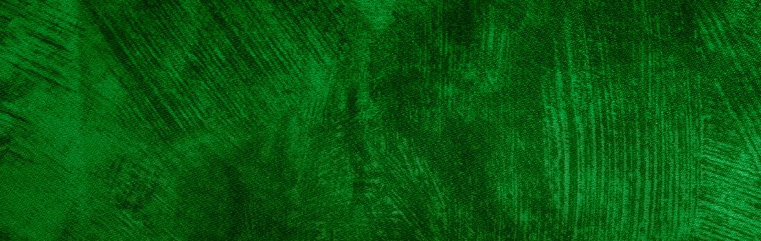 green cotton material with visible texture. background photo