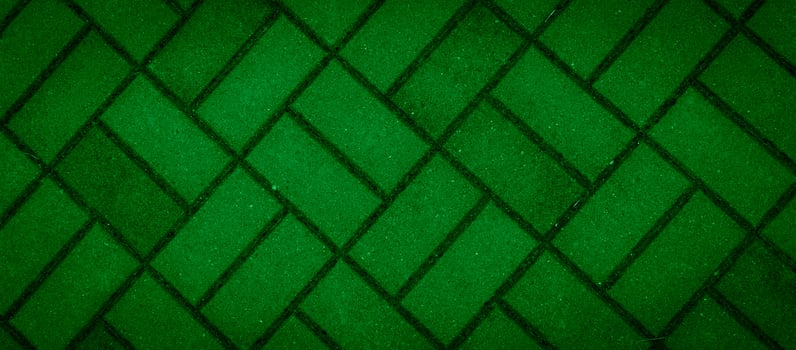 green paving stones with visible details. background photo