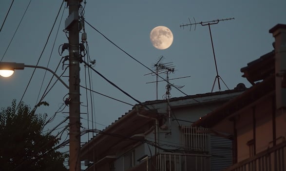 Evening cityscape with full moon photo