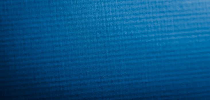 scratched blue metal sheet with visible texture. photo