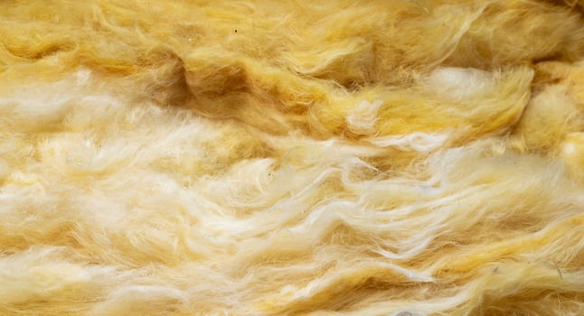 yellow mineral wool with a visible texture. background. photo