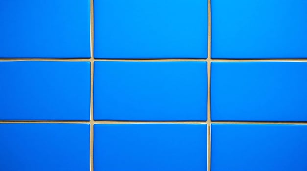 A blue wall with a square pattern photo