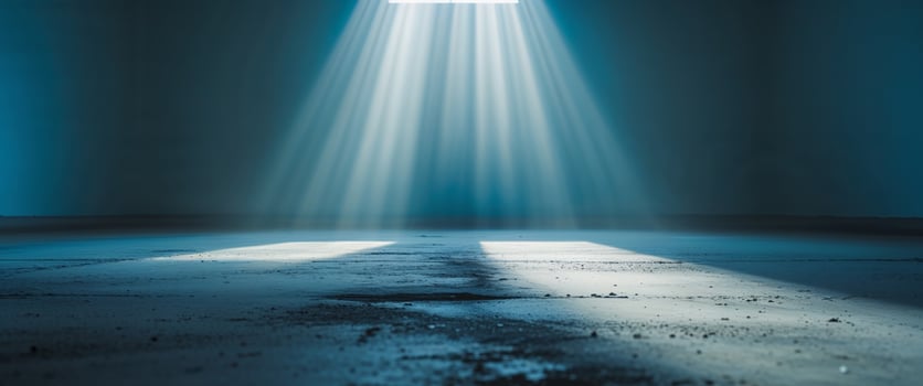 A light shining through a window in an empty room photo