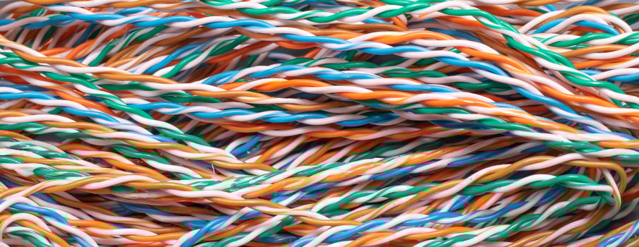 colored electrical wires in visible detail . background photo