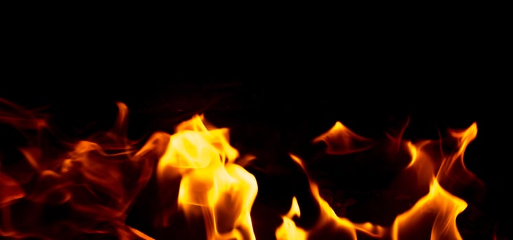 fire flames on black isolated background photo