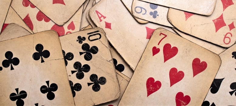 old yellowed poker cards. background or texture photo