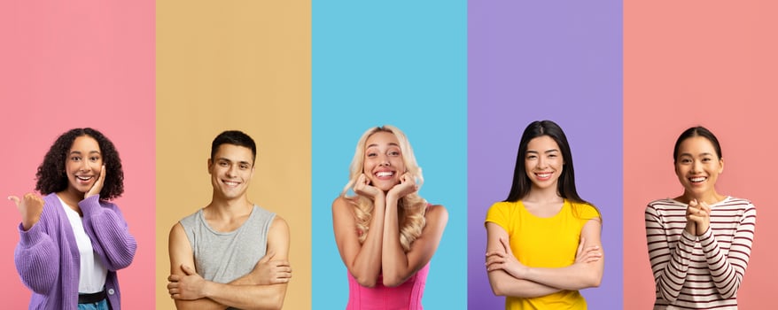 Five joyful individuals of various backgrounds stand together, each exuding positivity. Their bright smiles and playful expressions create an uplifting atmosphere against a colorful backdrop. photo