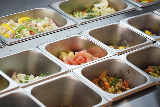 Variety of fresh ingredients displayed in a food preparation area photo