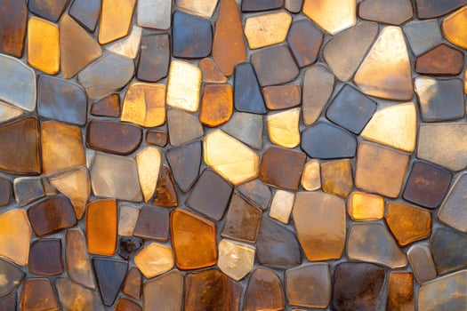 Colorful mosaic tiles creating a textured surface photo