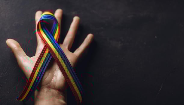 Vibrant rainbow ribbon, symbol of autism awareness, World Autism Awareness Day. photo