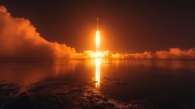 A rocket ascends powerfully into the atmosphere, casting an intense glow over the clouds and reflecting on the water's surface, showcasing the technological marvel of space exploration. photo