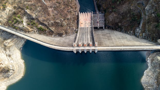 Aerial view of hydroelectric power plant dam holding back water photo