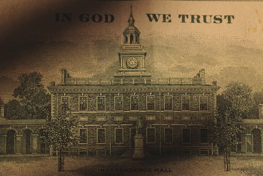 A Beautiful Vintage Currency Displaying the Phrase In God We Trust on Its Design photo