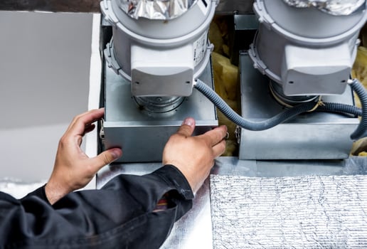 Ventilation cleaning. Specialist at work. Repair ventilation system photo