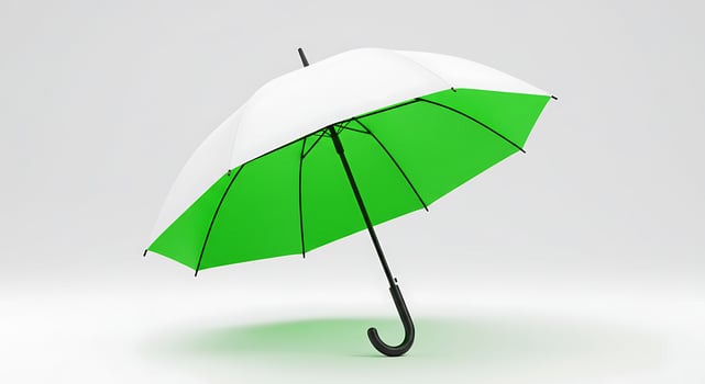Open Umbrella with White and Green Panels on a White Background photo