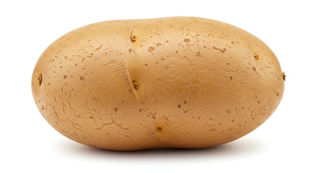 Isolated Raw Potato Close-up Showing Texture and Sprout Spots on White photo