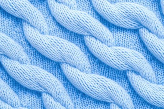 Hand-knitted blue cable knit fabric showcasing intricate texture and detail in Pantone Little Boy Blue perfect for textile enthusiasts photo