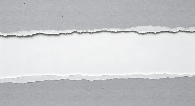 Torn Grey And White Paper Layers Creating Abstract Texture And Separation 1 photo
