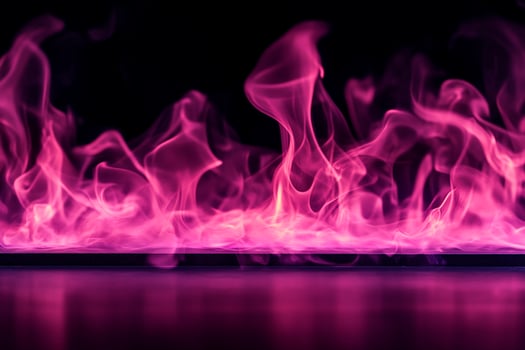 Pink Flames on Dark Surface photo