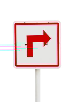red arrow sign on traffic panel photo