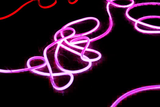 a vibrant and abstract composition of neon lights photo