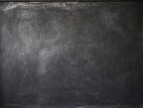 Blackboard rough textured surface appears to be old Chalk black board. photo