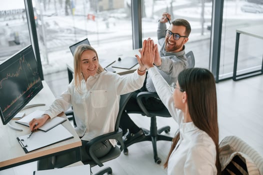 Doing ,high five. Successful ,team are working together in the office. Conception of business photo