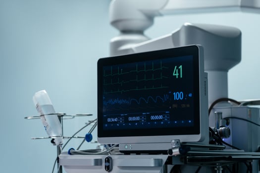 EKG monitor in intra aortic balloon pump machine. Electrocardiogram in surgery, cardiology and check on vitals in operation. Doctor, healthcare and procedure with medical equipment in hospital photo