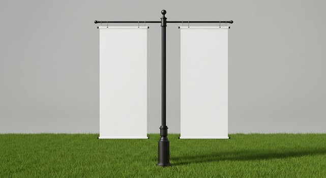 Blank Street Banner Mockup Hanging on Metal Pole in Green Field photo