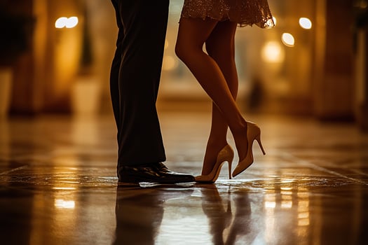 Legs of a man and a woman dancing variety dances. A dance class photo