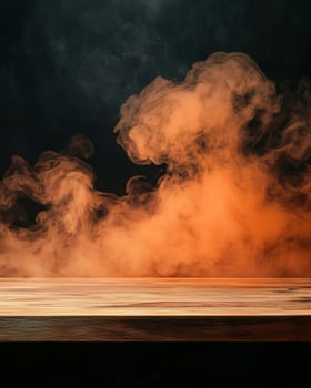 Wooden Tabletop with Orange Smoke Background photo