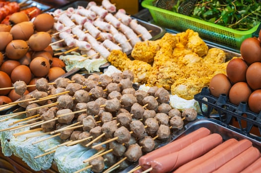 Fried food on sticks, Asian-style dishes, street food in Vietnam photo