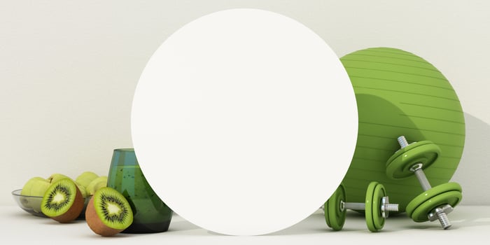 A fresh green-themed fitness scene featuring a white circular board, dumbbells, an exercise ball, and kiwi with a smoothie, emphasizing a balanced and healthy lifestyle. 3d rendering. photo