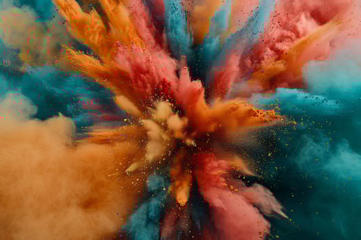 Colorful powder explosion on a blue background photo
